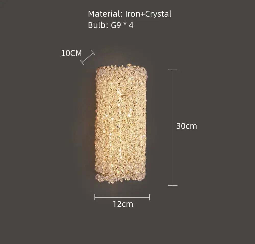 Modern gold metal crystal wall light with textured iron and crystal design creating a sparkling golden glow for bedroom decorbites gold metal