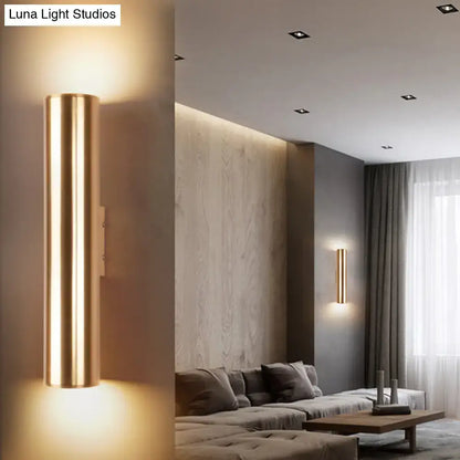Modern gold cylindrical metal fixture wall lamp with sleek design for corridor lighting