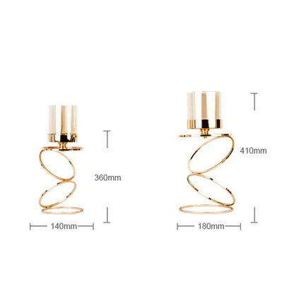 Modern gold metal frame glass candle holder featuring gold-toned spiral metal holders with clear glass tops decorbites gold metal decor