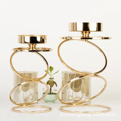 Modern gold metal frame candle holder with clear glass cylinders and circular ring design for dining room decorbites gold metal