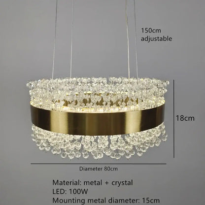 Modern gold metal led chandelier with gold-toned circular frame and cascading clear crystal droplets for dining room decorbites gold metal
