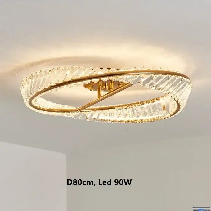 Modern gold metal led crystal ceiling light featuring gold-toned circular design with faceted crystal rings for living room decorbites gold metal
