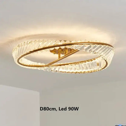 Modern gold metal led crystal ceiling light featuring gold-toned circular design with faceted crystal rings for living room decorbites gold metal