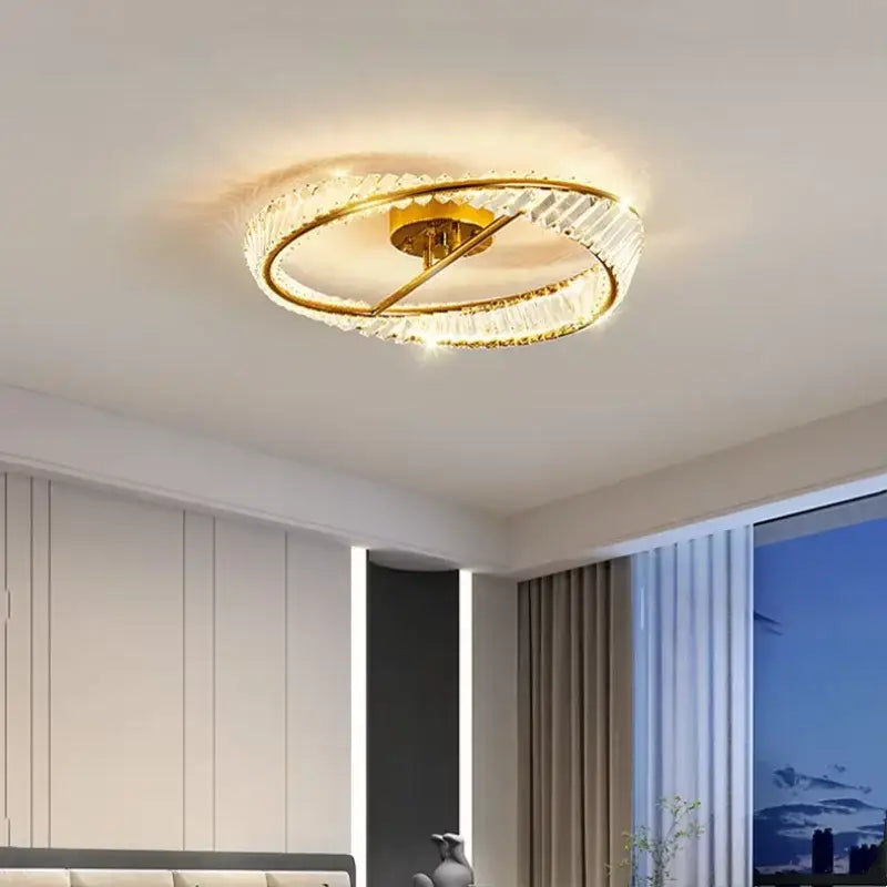 Modern gold metal led crystal ceiling light with gold-toned circular design and crystal accents for living room decorbites gold metal