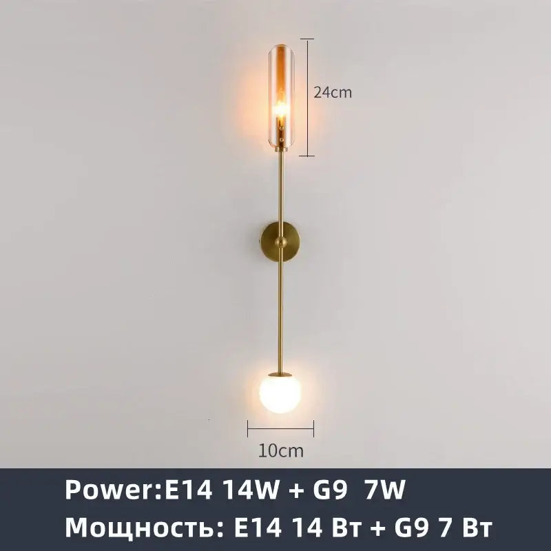 Modern brass decorbites gold metal wall sconce with cylindrical glass shade and frosted globe for bedroom lighting