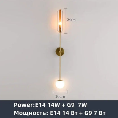 Modern brass decorbites gold metal wall sconce with cylindrical glass shade and frosted globe for bedroom lighting