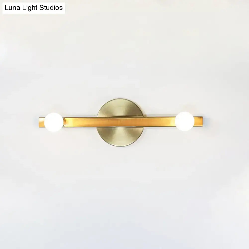 Modern gold metallic linear sconce light with two white spherical bulbs and circular backplate for bedroom vanity 220v-240v 110v-120v