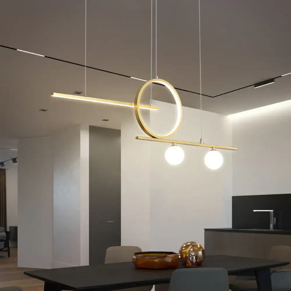 Modern gold-toned DecorBites minimalist LED island ceiling light with globe acrylic shade for dining room in black gold white