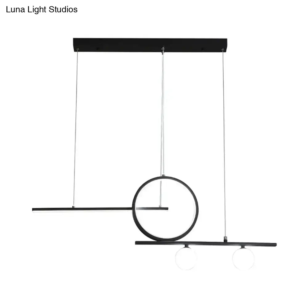 Modern black minimalist pendant light with geometric design and globe acrylic shade for dining room and kitchen
