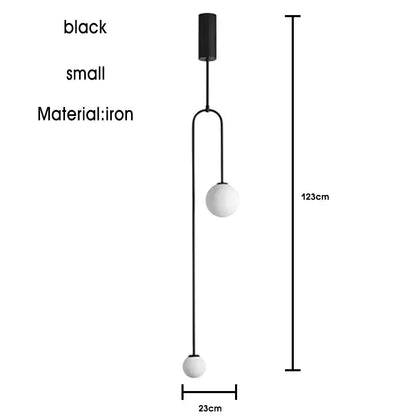 Black iron pendant light with two white spherical glass shades in a modern gold minimalist iron chandelier for dining room decorbites black