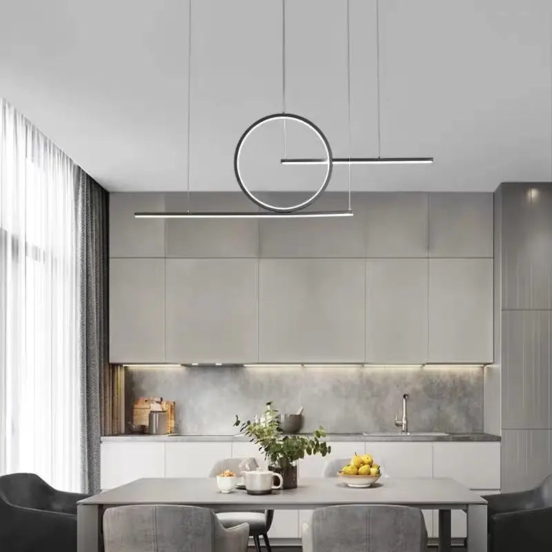 DecorBites™ minimalist led island pendant light with black halo ring frame suspended above dining room table