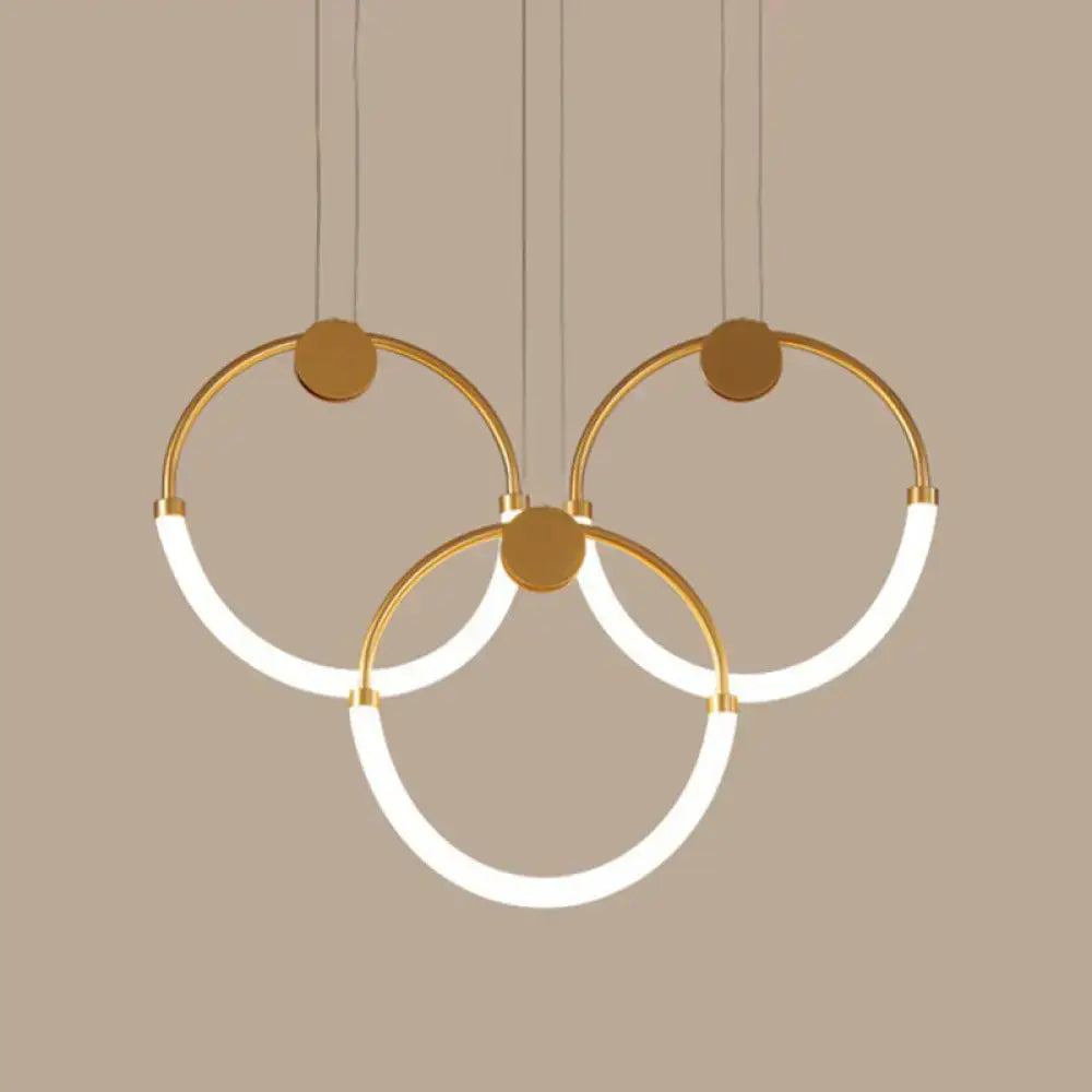Modern gold minimalistic ring pendant light with illuminated white led rings for living room lighting