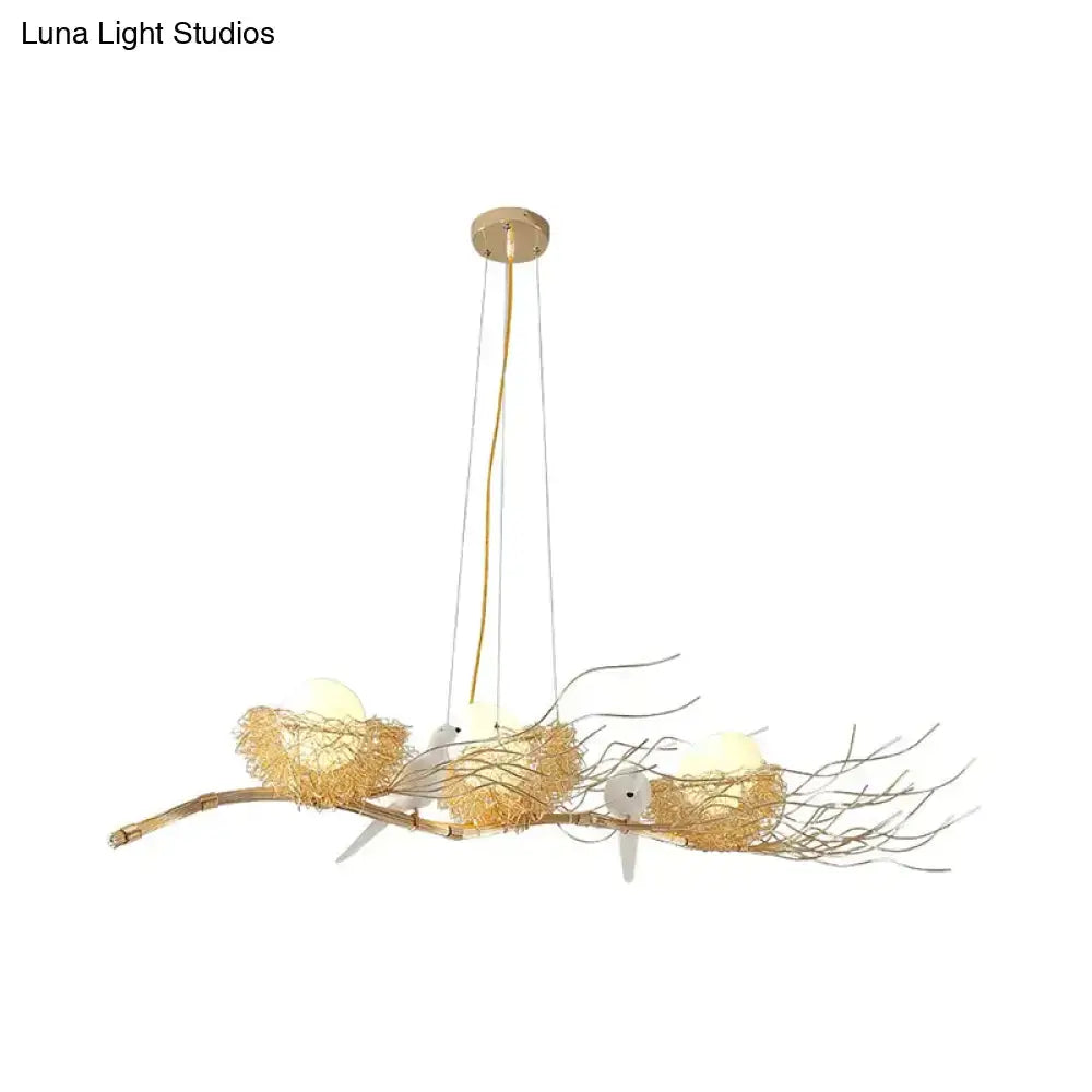 Decorbites™ modern gold nest island pendant chandelier with three woven gold nests and white bulbs on metal branch