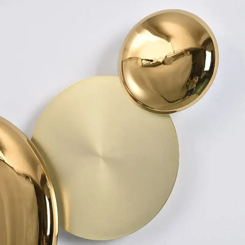 Modern gold nordic led wall lamp with gold-toned spherical sconce featuring polished reflective and brushed metallic surfaces