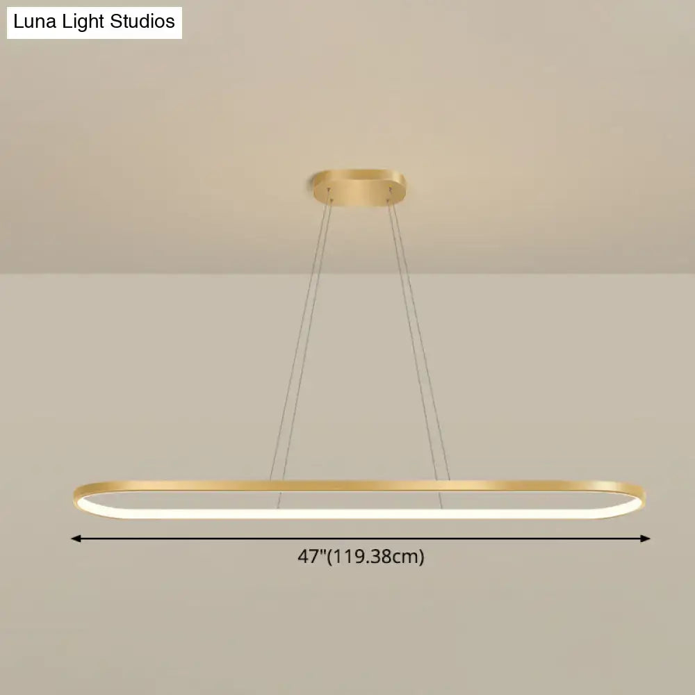 Modern gold oblong pendant light fixture with brushed gold finish, warm white led strip, and adjustable chain cord length