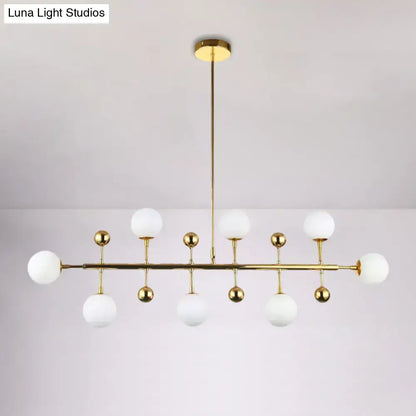 Decorbites modern gold hotel linear chandelier ceiling pendant with seven opal glass globe shades fixture width design