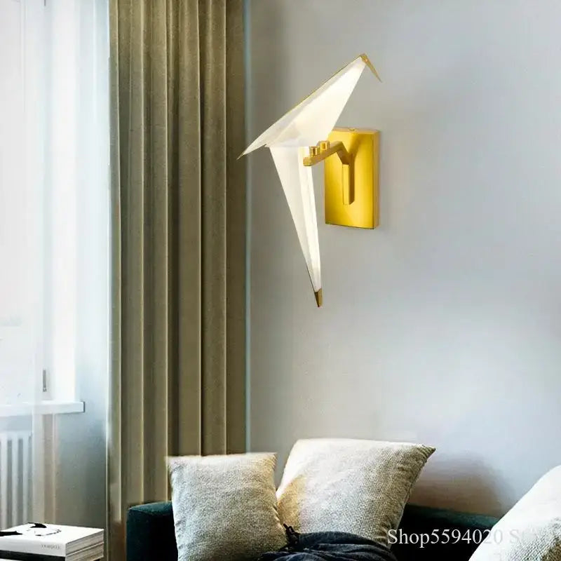 Modern gold origami bird led wall lamp with white paper-like body and metallic accents for bedroom or living room use