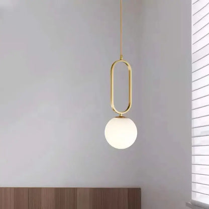 Modern gold oval pendant light featuring a frosted glass ball ideal for dining room decorbites pendant lights