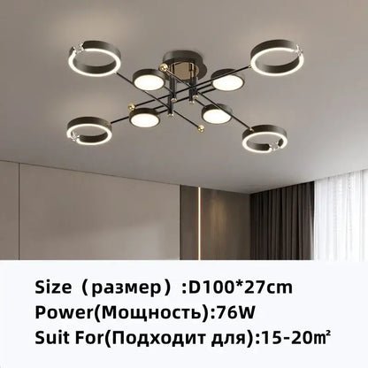Modern gold plated chandelier with black arms featuring circular rings and glowing led bulbs for living room decorbites gold plated