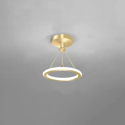 Modern decorbites gold plated chandelier with black arms featuring a gold-toned circular illuminated pendant light