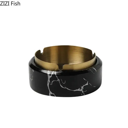 Black marble texture ashtray with a gold plated interior and cut-out slots by decorbites for modern living room use