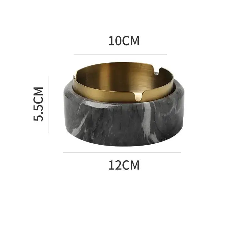 A modern gold plated ashtray with dark gray marble texture base for living room decor by decorbites gold plated