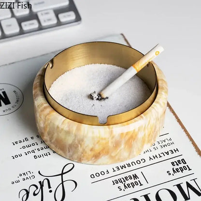 Modern gold plated ashtray with marble texture beige cream body and metallic rim for living room smoking decorbites gold plated
