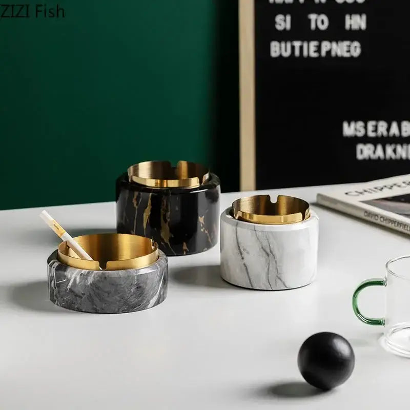 Three elegant gold plated marble texture ashtrays with black and white veined patterns for modern decorbites decor