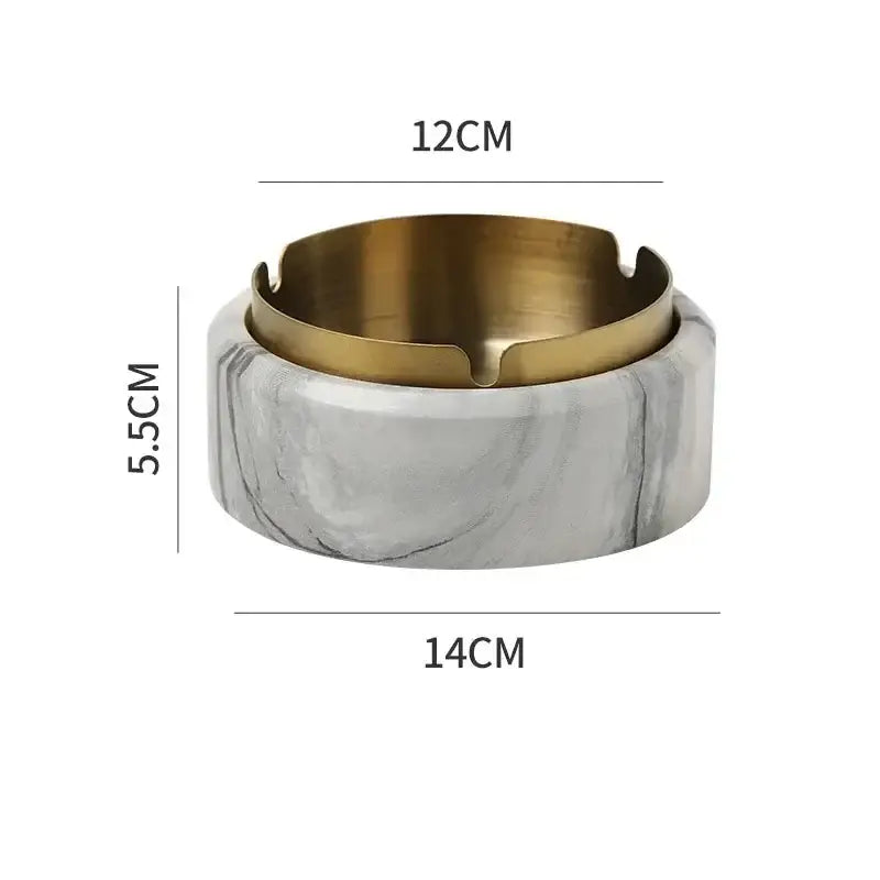 A modern gold plated ashtray with a white marble texture base for stylish living room decorbites gold plated tray