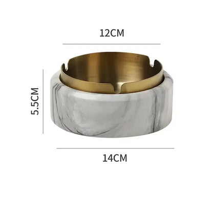A modern gold plated ashtray with a white marble texture base for stylish living room decorbites gold plated tray