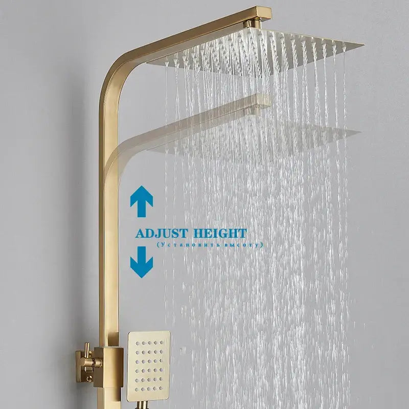 Modern gold rain shower system with gold-toned adjustable large rectangular rainhead and smaller handheld sprayer for bathroom