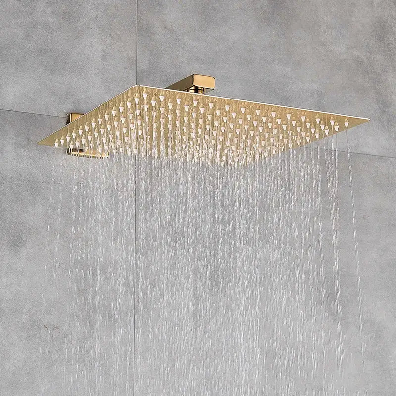 Modern gold rainfall shower system featuring a gold rainfall shower square showerhead with triangular nozzles spraying water decorbites gold rainfall