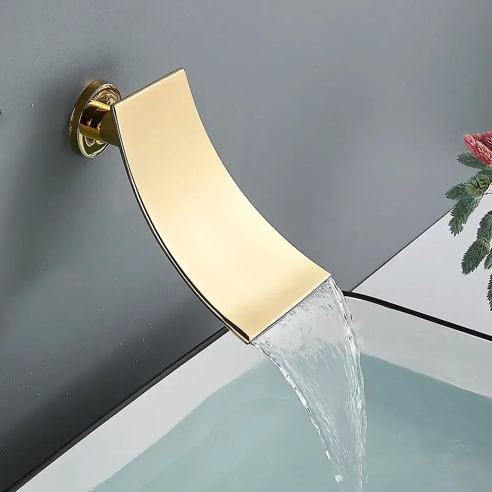 Gold-toned waterfall bathtub faucet with sleek curved design and polished finish in decorbites gold rainfall shower system
