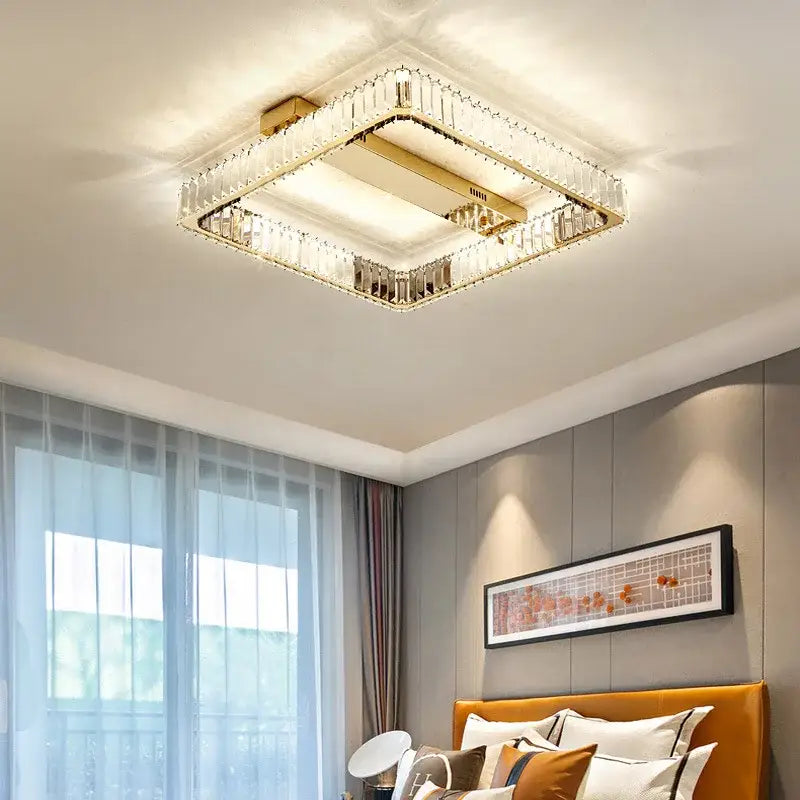 Modern gold rectangular crystal ceiling chandelier with a gold finish frame and illuminated center dimmable decorbites crystal ceiling