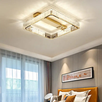 Modern gold rectangular crystal ceiling chandelier with a gold finish frame and illuminated center dimmable decorbites crystal ceiling