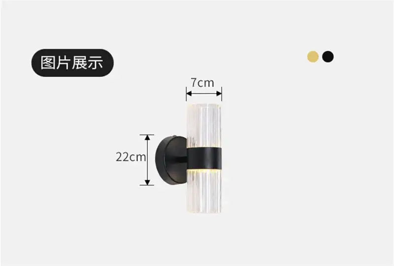 Modern wall lamp with clear ribbed glass shade and black metal base emitting warm light for bedroom luxury ambiance