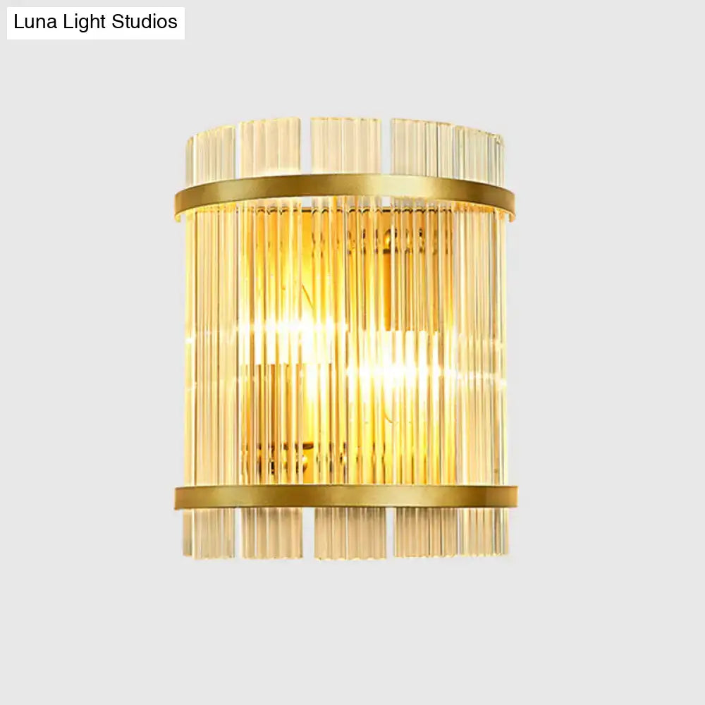 Modern gold ribbed glass wall mount light with vertical glass rods and brass bands for living room wall use