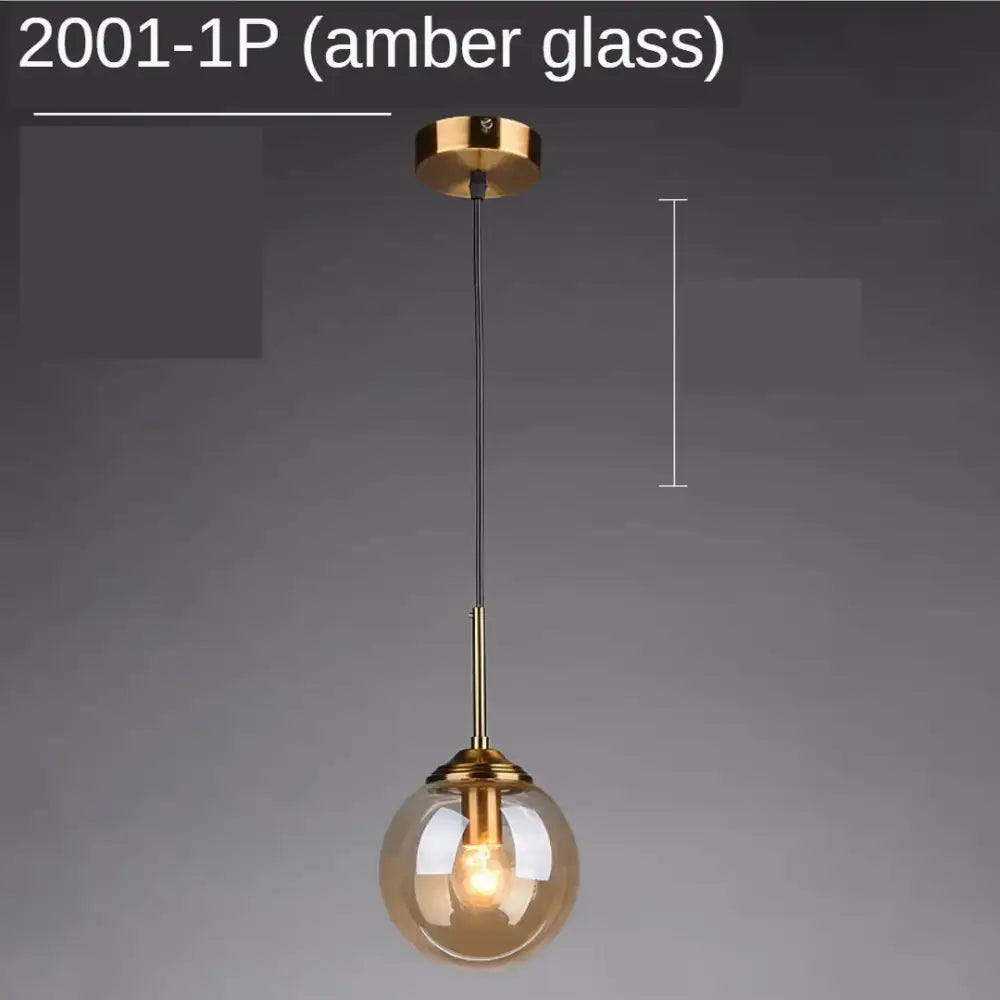 Modern gold ring glass globe pendant light with amber spherical glass globe and brass hardware for dining room