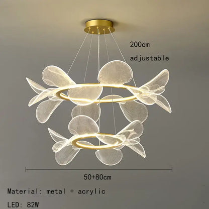 Modern gold ring led pendant light with gold-toned metal and acrylic rings featuring leaf cluster design for dining room decorbites gold ring