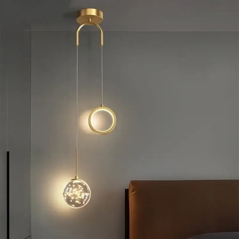 Modern gold ring led pendant light featuring a sleek circular fixture with a glowing ring and crystal globe decorbites gold ring