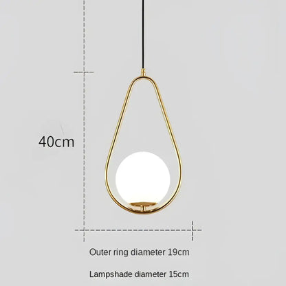 Modern gold ring pendant light featuring a gold-toned teardrop pendant light with frosted glass shade decorbites gold ring