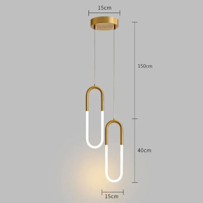 Modern gold ring pendant lights with a sleek white u-shaped design for minimalist dining room decorbites gold ring fixture