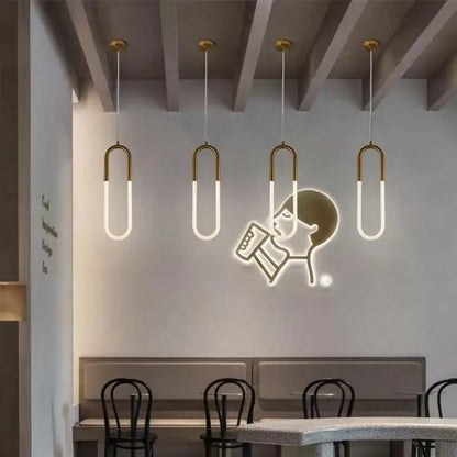 Four modern gold ring pendant lights with frosted glass shades and metal frames for dining room decorbites gold ring fixture