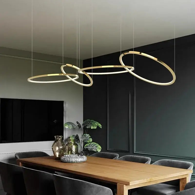 Modern gold round ceiling chandelier with sleek interlocking ring design for dining room decorbites gold round lighting
