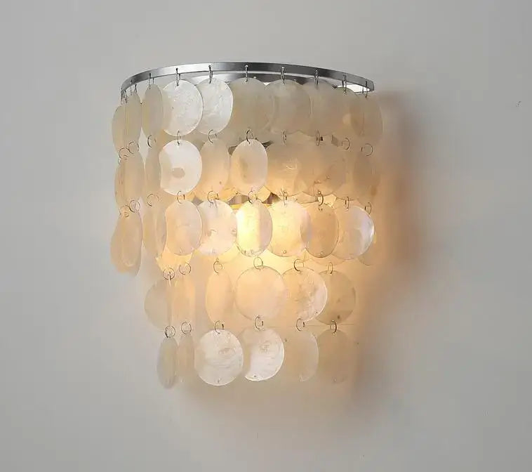 A warm glowing modern gold shell chandelier with iridescent mother-of-pearl shells for living room decorbites gold shell