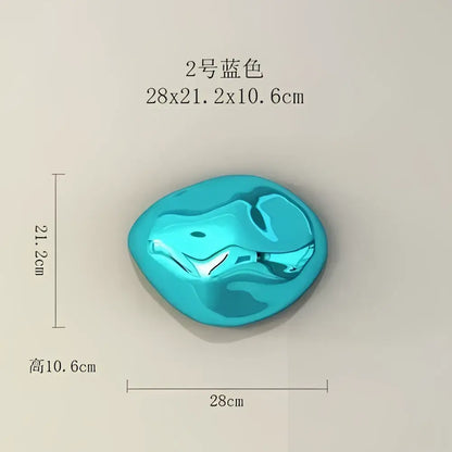 A glossy turquoise blue irregular stone wall ornament with a smooth reflective surface for modern living room decor