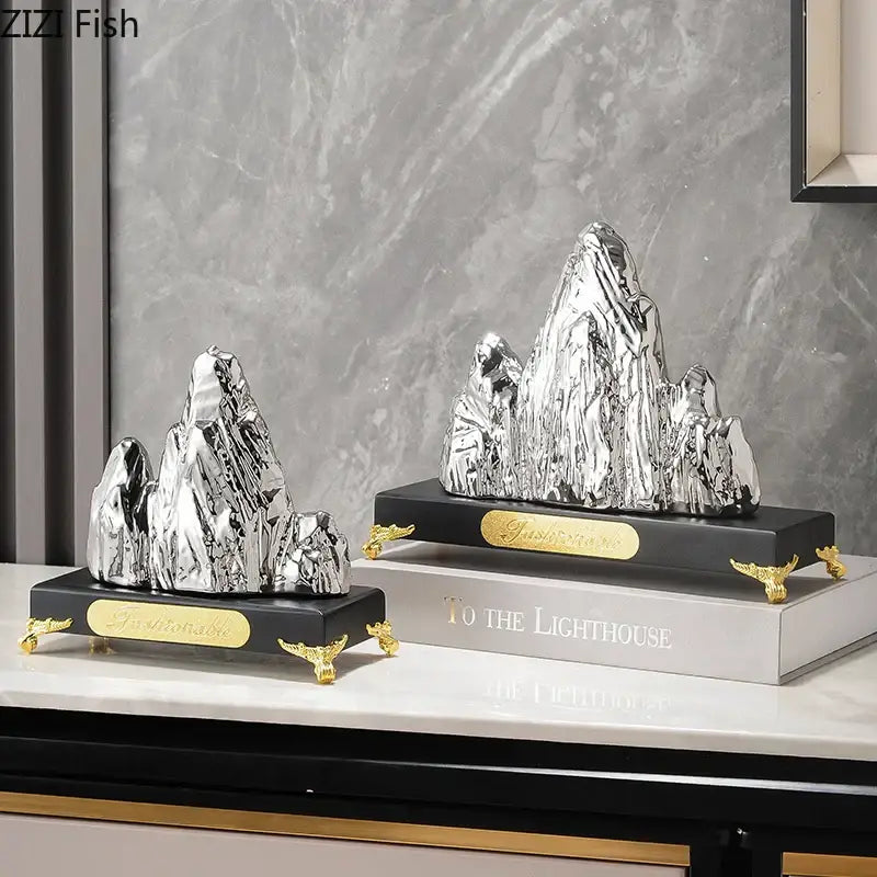 Modern gold and silver ceramic mountain sculpture with glossy silver finish and gold accents for living room decorbites decor