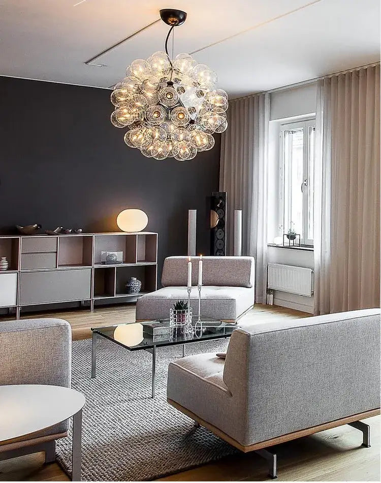 Modern gold and silver clear glass bubble chandelier with spherical clear glass orbs clustered for dining room light