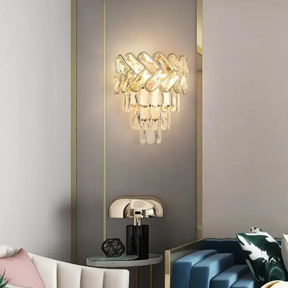 Modern gold and silver decorbites crystal wall sconce with stainless steel frame and cascading clear glass prisms