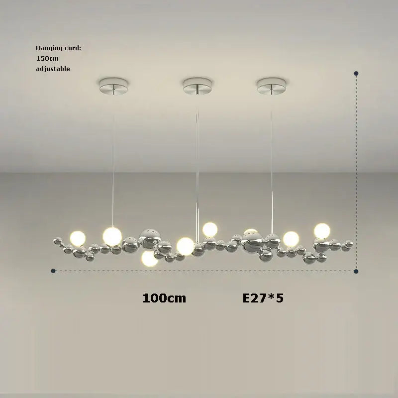 Modern chrome-finished pendant light with five spherical bulbs in a decorbites dimmable led hanging design